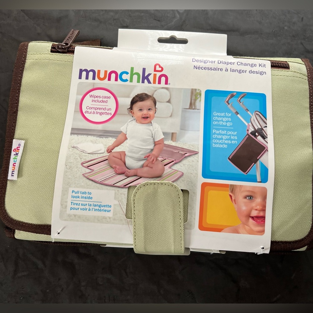 Diaper changing kit with wipe case.
